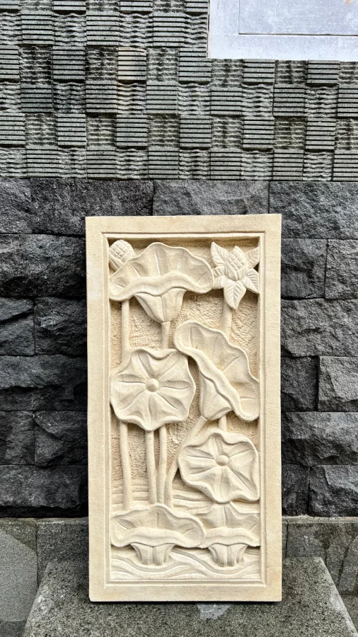 Panel relief batu paras yogya motif bunga teratai dan daun lotus air berbingkai lis